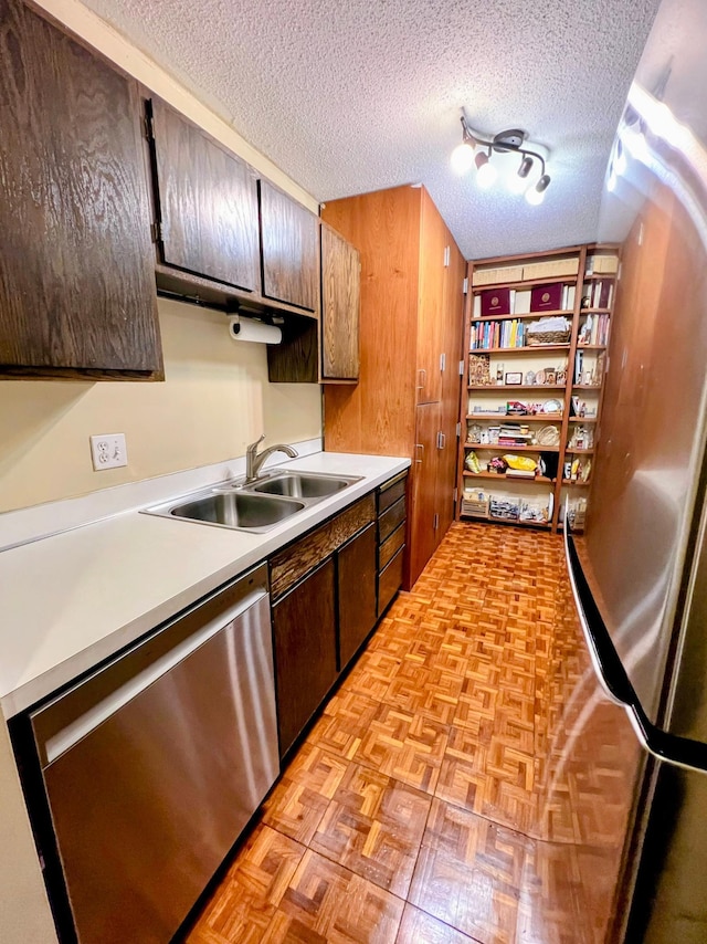 1200 Nicollet Mall Unit 205, Minneapolis, MN 55403 - kitchen with dishwasher, light countertops, and a textured ceiling