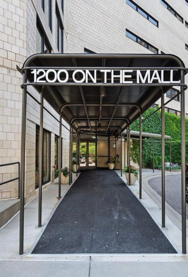 1200 Nicollet Mall Unit 205, Minneapolis, MN 55403 - view of parking / parking lot featuring a detached carport