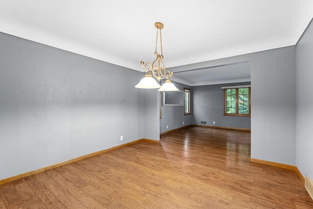 1218 4th Ave SE, Austin, MN 55912 - empty room featuring light wood-style floors