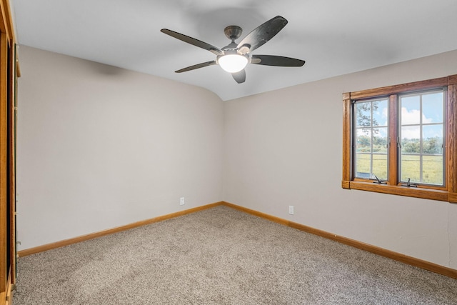 1218 4th Ave SE, Austin, MN 55912 - carpeted spare room with baseboards and ceiling fan