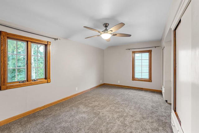 1218 4th Ave SE, Austin, MN 55912 - unfurnished bedroom with carpet floors, ceiling fan, and a closet