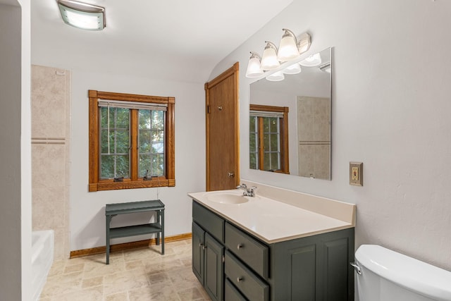 1218 4th Ave SE, Austin, MN 55912 - full bath featuring vanity and stone finish floors