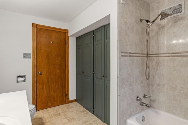1218 4th Ave SE, Austin, MN 55912 - bathroom with a closet and  shower combination
