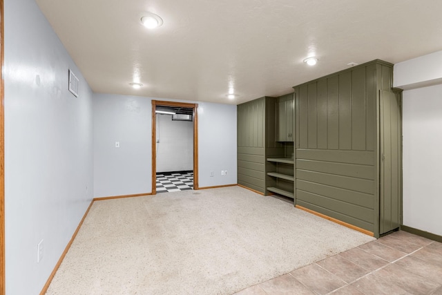 1218 4th Ave SE, Austin, MN 55912 - finished below grade area featuring baseboards and light colored carpet