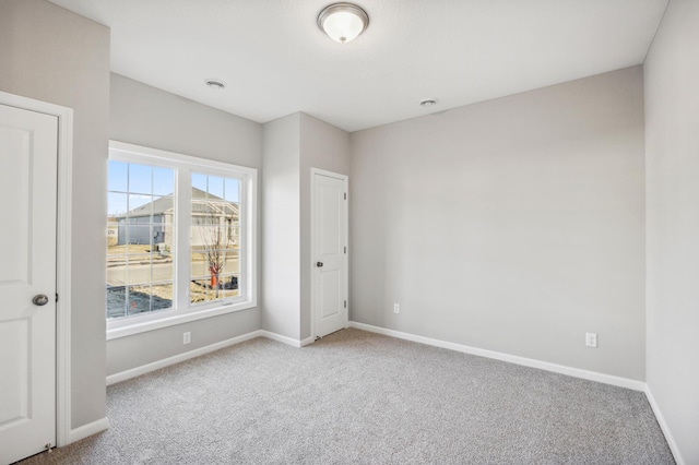 8007 Walnut Ln, Corcoran, MN 55340 - unfurnished bedroom with carpet flooring and multiple windows