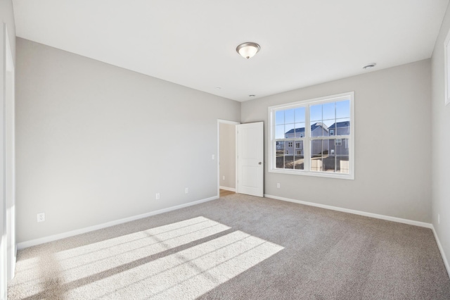 8007 Walnut Ln, Corcoran, MN 55340 - carpeted empty room with baseboards