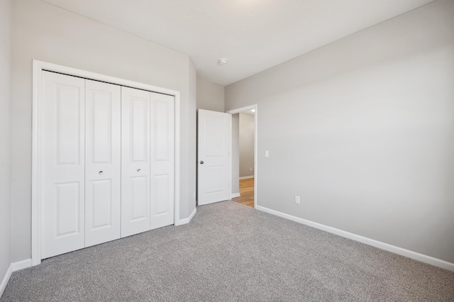 8007 Walnut Ln, Corcoran, MN 55340 - unfurnished bedroom featuring carpet floors and a closet