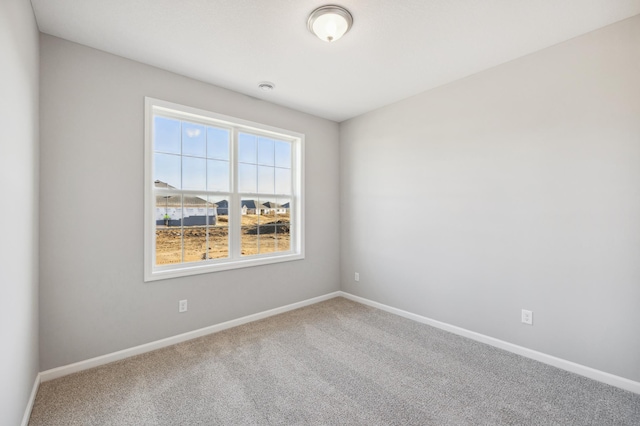 8007 Walnut Ln, Corcoran, MN 55340 - unfurnished room with carpet floors and baseboards