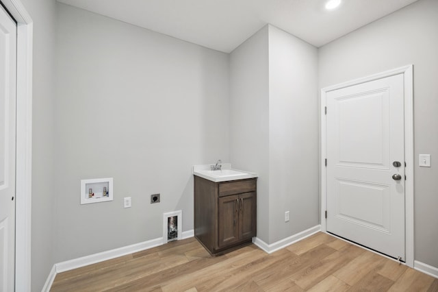 8007 Walnut Ln, Corcoran, MN 55340 - washroom featuring electric dryer hookup, light wood-style flooring, hookup for a washing machine, and recessed lighting