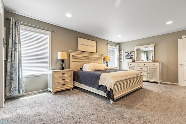 5480 Tanner Ave S, Fargo, ND 58104 - carpeted bedroom with recessed lighting and multiple windows
