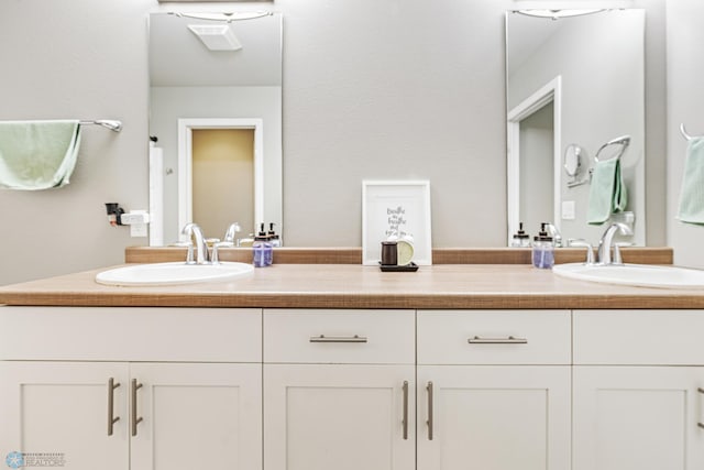 5480 Tanner Ave S, Fargo, ND 58104 - bathroom featuring double vanity