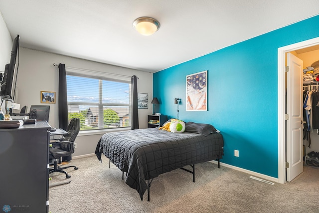 5480 Tanner Ave S, Fargo, ND 58104 - bedroom featuring carpet, a desk, and a walk in closet