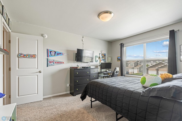 5480 Tanner Ave S, Fargo, ND 58104 - carpeted bedroom with baseboards and a desk