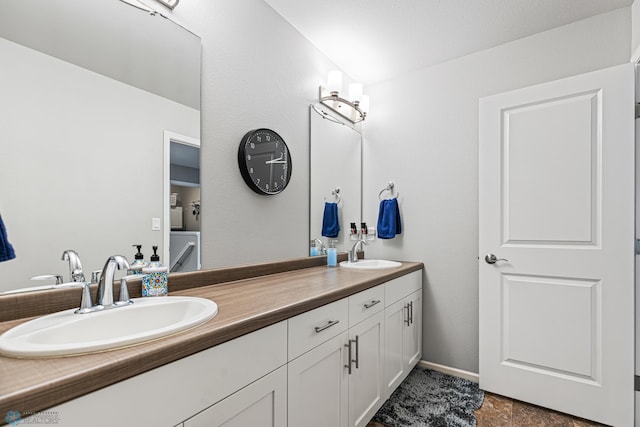5480 Tanner Ave S, Fargo, ND 58104 - bathroom featuring double vanity