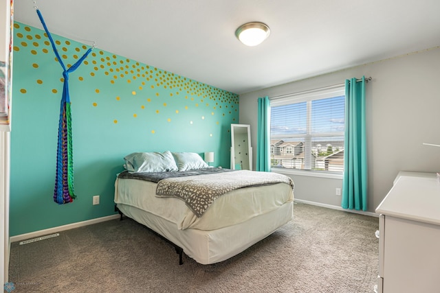 5480 Tanner Ave S, Fargo, ND 58104 - bedroom with carpet floors and an accent wall