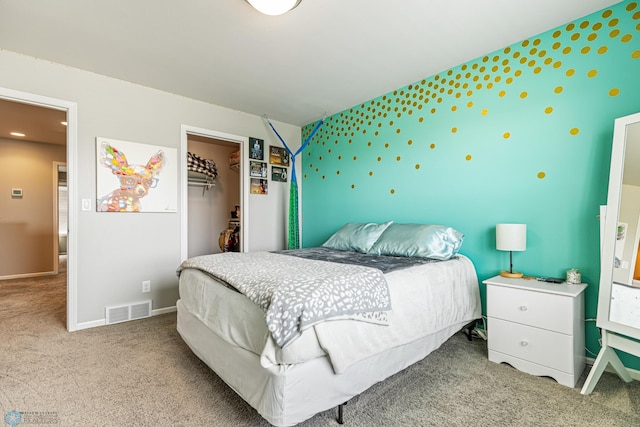 5480 Tanner Ave S, Fargo, ND 58104 - bedroom featuring carpet floors, a closet, and a spacious closet