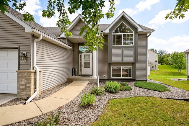 1212 Francis Dr, Elko New Market, MN 55054 - view of front facade featuring an attached garage, a front yard, and a shingled roof