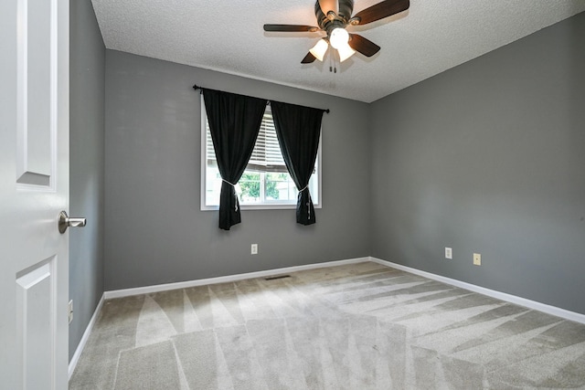 1212 Francis Dr, Elko New Market, MN 55054 - empty room featuring a ceiling fan, a textured ceiling, and carpet flooring