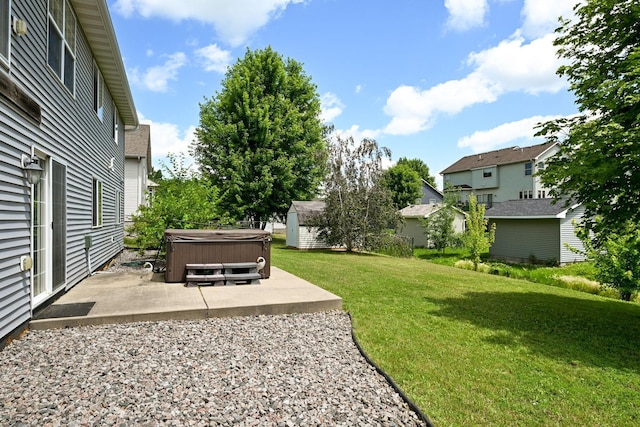 1212 Francis Dr, Elko New Market, MN 55054 - view of green lawn featuring a hot tub, a patio area, and a residential view