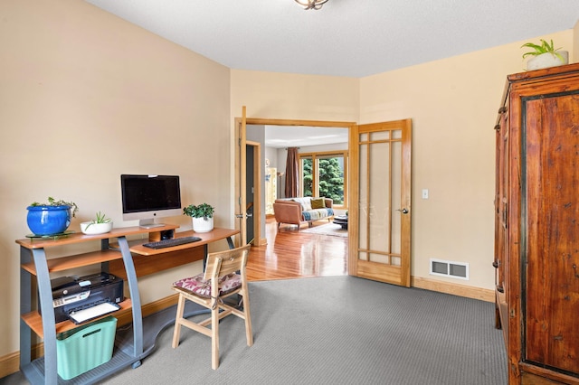 2334 Veterans Memorial Blvd NW, Andover, MN 55304 - carpeted office space with baseboards and french doors