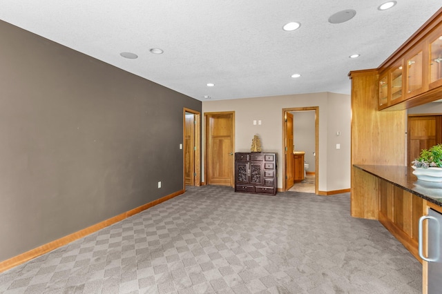 2334 Veterans Memorial Blvd NW, Andover, MN 55304 - interior space with recessed lighting, light carpet, and a textured ceiling