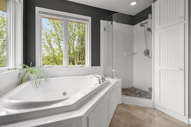 2334 Veterans Memorial Blvd NW, Andover, MN 55304 - full bathroom featuring a shower stall, a whirlpool tub, plenty of natural light, and recessed lighting