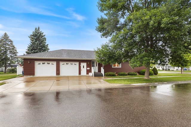 109 Pine Ave N, Canby, MN 56220 - single story home featuring concrete driveway, a front yard, a garage, and a shingled roof