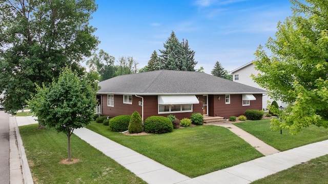 109 Pine Ave N, Canby, MN 56220 - ranch-style house featuring a front yard and roof with shingles