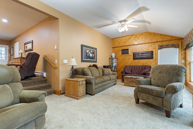 109 Pine Ave N, Canby, MN 56220 - living room featuring wooden walls, carpet floors, lofted ceiling, ceiling fan, and a baseboard heating unit