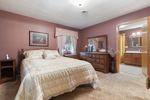 109 Pine Ave N, Canby, MN 56220 - bedroom with light carpet and ensuite bath