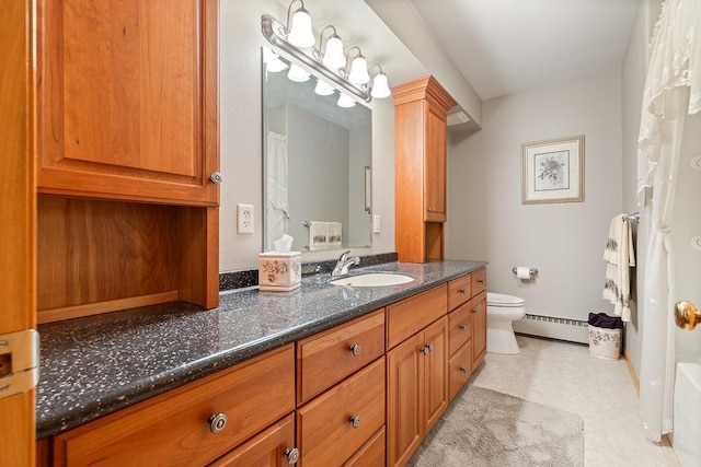 109 Pine Ave N, Canby, MN 56220 - bathroom featuring vanity, a baseboard heating unit, and tile patterned floors