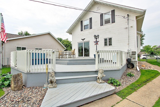 1936 5th St, Red Wing, MN 55066 - rear view of house featuring a wooden deck
