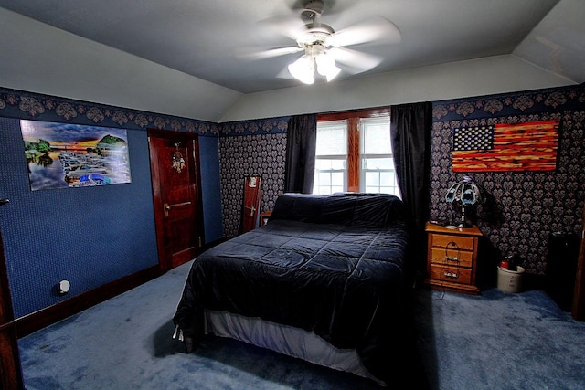 1936 5th St, Red Wing, MN 55066 - bedroom with carpet floors, vaulted ceiling, wallpapered walls, and ceiling fan