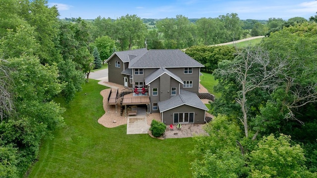 18505 210th Ave NE, Paynesville, MN 56362 - aerial view of property and surrounding area featuring a heavily wooded area