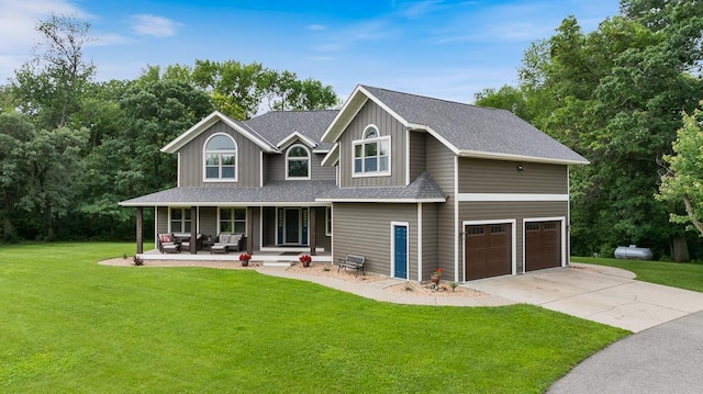 18505 210th Ave NE, Paynesville, MN 56362 - view of front of property with a porch, a garage, a front yard, and roof with shingles