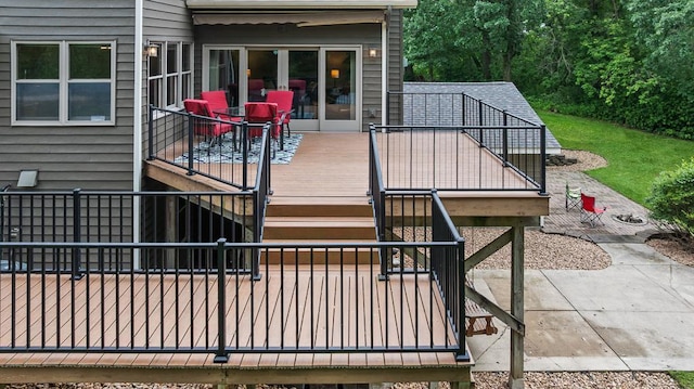 18505 210th Ave NE, Paynesville, MN 56362 - wooden deck with stairway and a patio area
