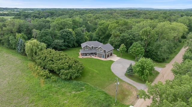 18505 210th Ave NE, Paynesville, MN 56362 - aerial view of property and surrounding area with a heavily wooded area