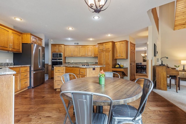 18505 210th Ave NE, Paynesville, MN 56362 - dining space featuring recessed lighting, dark wood-type flooring, and a chandelier