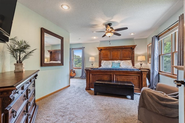 18505 210th Ave NE, Paynesville, MN 56362 - bedroom featuring light carpet, multiple windows, a textured ceiling, and recessed lighting