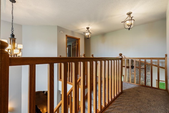 18505 210th Ave NE, Paynesville, MN 56362 - hall featuring a chandelier, carpet flooring, and an upstairs landing