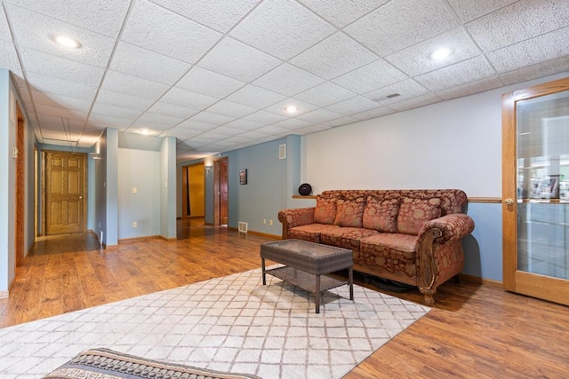18505 210th Ave NE, Paynesville, MN 56362 - living room with wood finished floors, recessed lighting, and a paneled ceiling