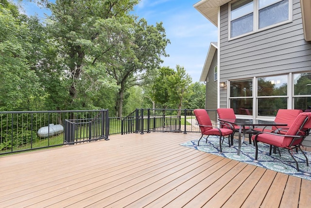18505 210th Ave NE, Paynesville, MN 56362 - deck featuring outdoor dining area