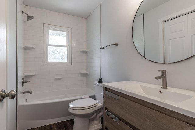 1744 Oak Rd, Saint Cloud, MN 56303 - bathroom with vanity, shower / tub combination, and wood finished floors