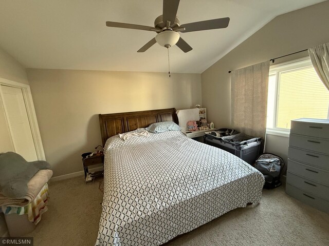 1004 Triumph Trl NE, Isanti, MN 55040 - carpeted bedroom featuring vaulted ceiling and a ceiling fan