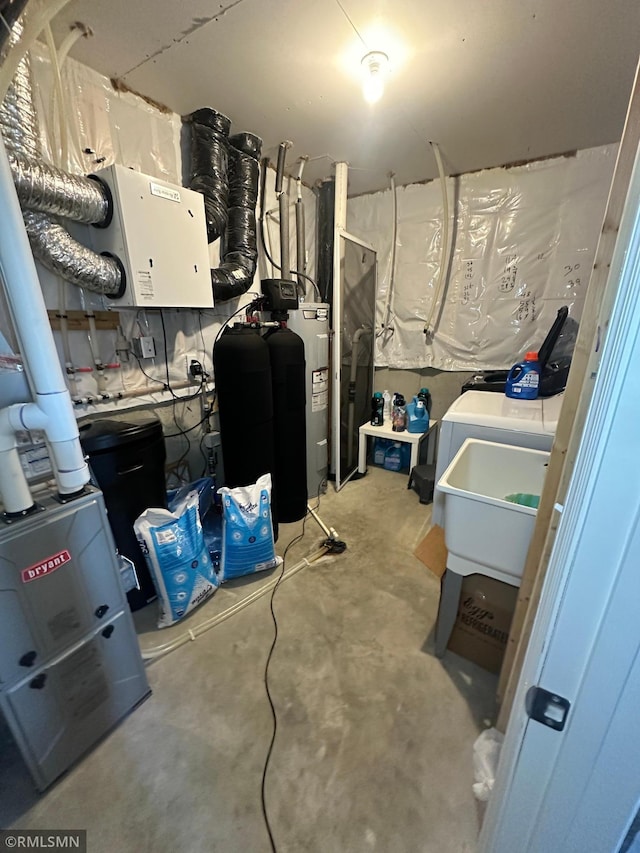 1004 Triumph Trl NE, Isanti, MN 55040 - unfinished basement featuring a water softener system