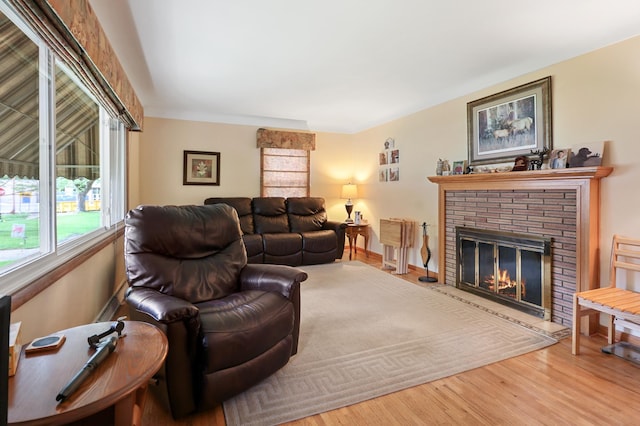 842 28th Ave N, Saint Cloud, MN 56303 - living area with wood finished floors and a fireplace