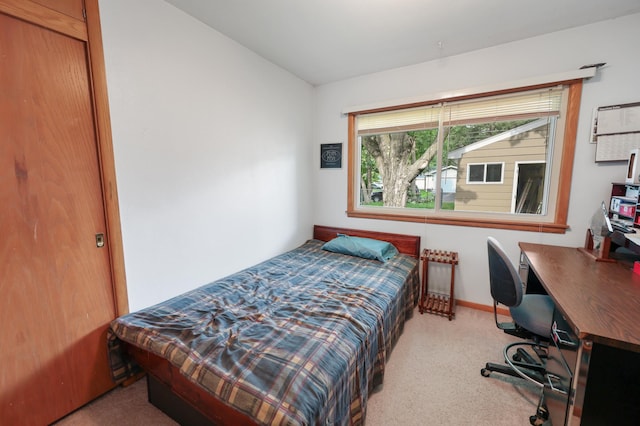 842 28th Ave N, Saint Cloud, MN 56303 - carpeted bedroom with an office area and baseboards