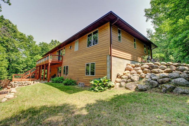 22896 Anchor Dr, Menahga, MN 56464 - back of property with a yard, a deck, and stairway