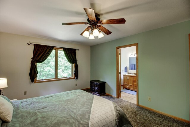 22896 Anchor Dr, Menahga, MN 56464 - bedroom featuring light carpet, ensuite bath, and a ceiling fan