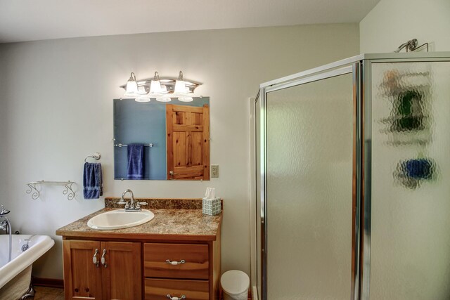22896 Anchor Dr, Menahga, MN 56464 - full bathroom with a shower stall, vanity, and a freestanding tub